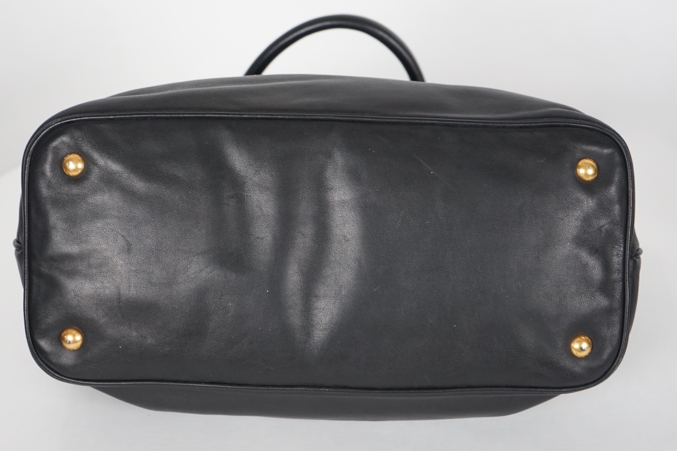 A Prada Vitello black leather bag with detachable strap, width 40cm, max heigh 27cm, depth 17cm